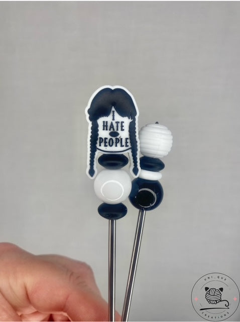 Pair of i hate people amigurumi sticks