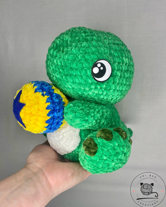 T rex  plushie hand made super soft crochet dinosaur holding a ball