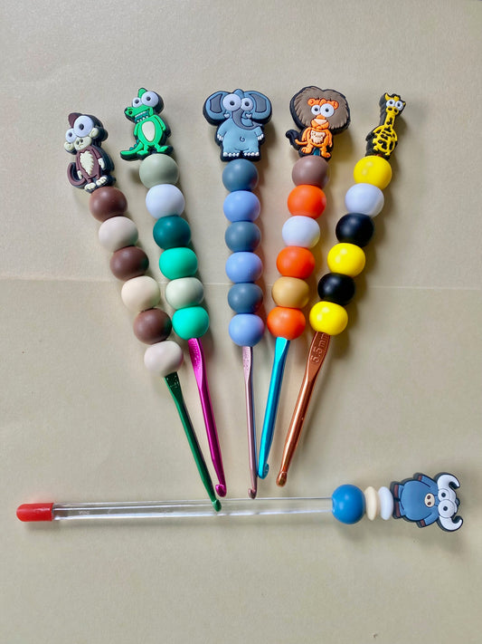 A Set of 5 animal  custom beaded crochet hooks and stuffing stick