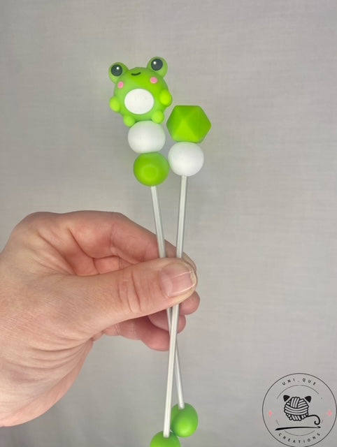 Pair of frog mini amigurumi sticks