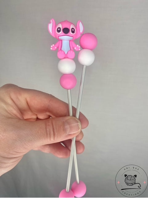 Pair of stitch mini amigurumi sticks