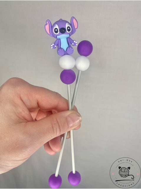 Pair of stitch mini amigurumi sticks