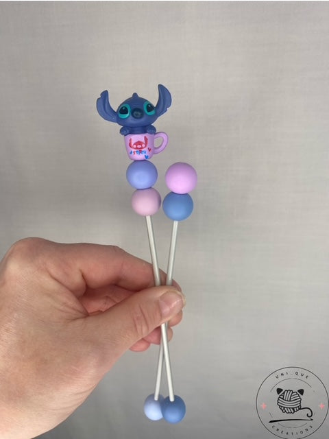 Pair of stitch mini amigurumi sticks