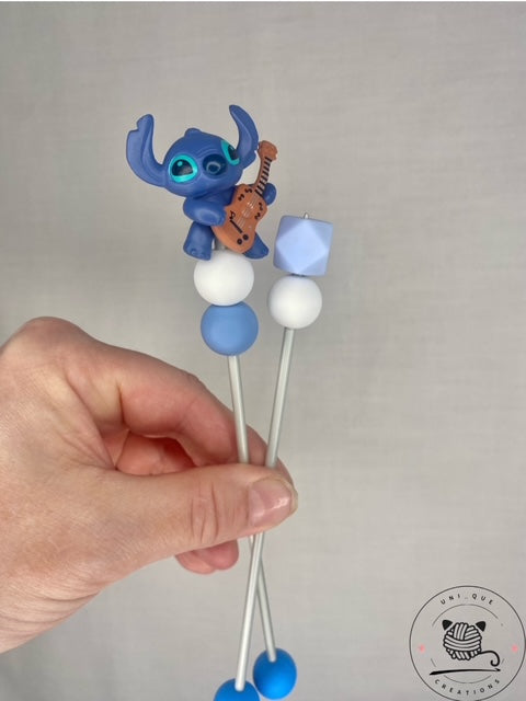 Pair of Stitch mini amigurumi sticks