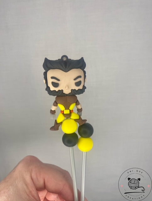 Pair or wolverine amigurumi sticks