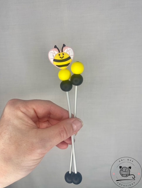 Pair of bee heart mini amigurumi sticks