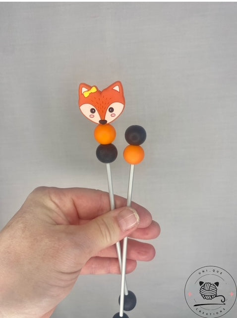 Pair of fox mini amigurumi sticks