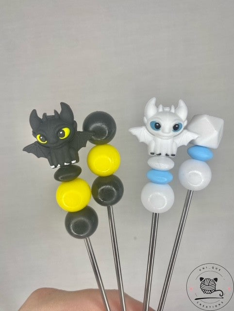 A Pair of Dragon amigurumi sticks