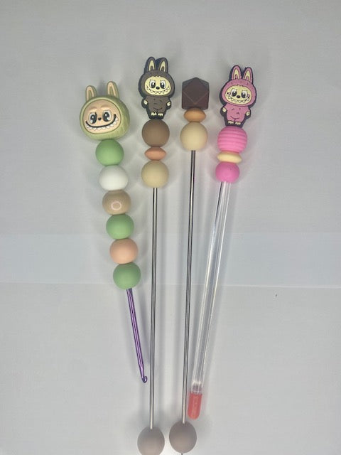 A Set of a Labubu custom beaded crochet hook amigurumi sticks and a stuffing stick