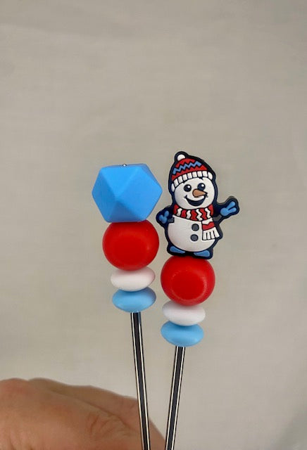 A pair of Snowman amigurumi sticks