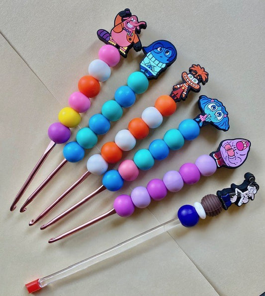 A Set of 5 Inside out custom beaded crochet hooks and stuffing stick