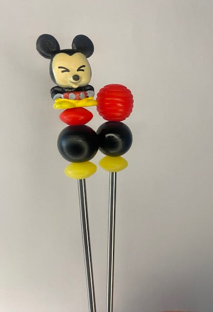A Pair of mickey amigurumi sticks