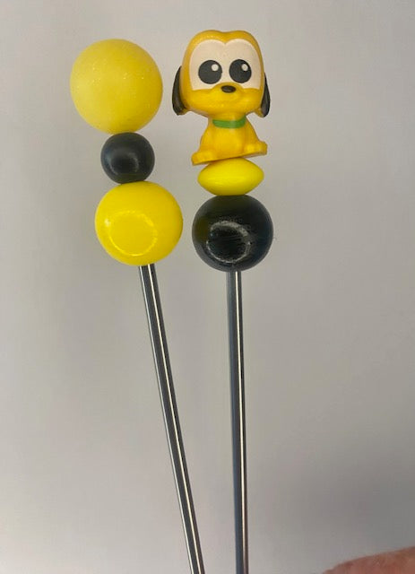 A Pair of Pluto amigurumi sticks